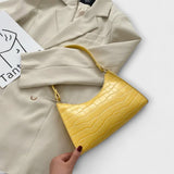 Cécile. - Lesklá kožená taška